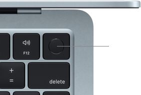 Showing the top-right corner of a MacBook Air keyboard in Sky Blue to highlight the Touch ID button